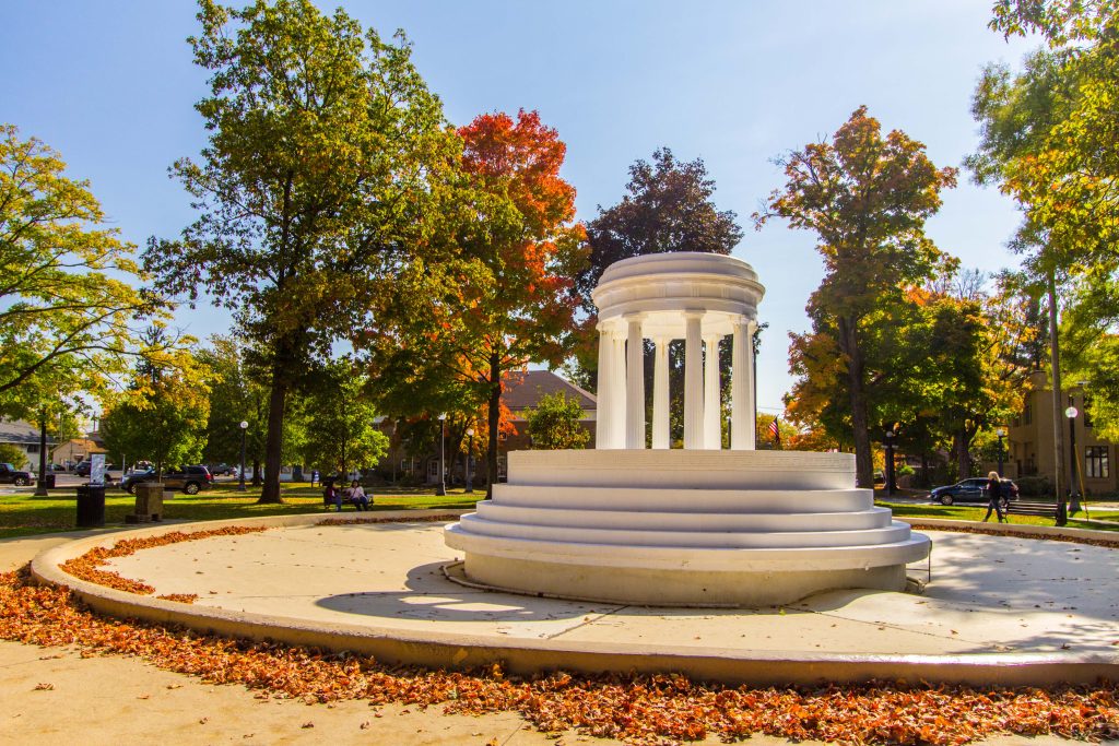Marshall, Michigan, USA - October 9, 2020: Brooks Fountain in downtown Marshall. Unveiled in 1930, it is a Greek Revival style that is a replica of Marie Antoinette's Temple of Love in Versailles.